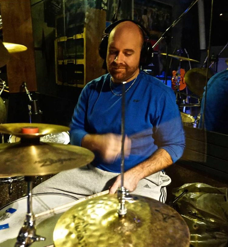 Kyle Norwood cutting drums to a record he wrote and recorded with Michael Jon in a major recording studio.
