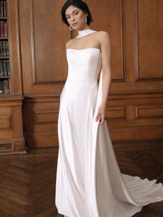 Cut in our luminous luxe satin fabric and cut with clean lines, the subtle drop waist silhouette flatters the figure beautifully. The included scarf accessory adds effortless drama to the ensemble.