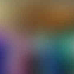 Wedding guests dancing on reception dance floor with colorful lighting