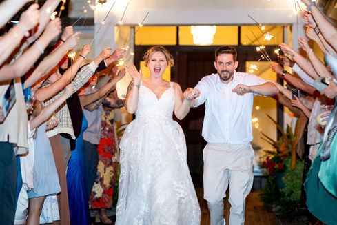 Bride and Groom during sparkler exit at Harbour House in Florida. Photo by Pixel Groves