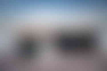 Bride and groom standing in a line with wedding party, smiling at The Shores in Daytona, Florida