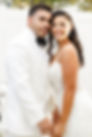 Backyard Wedding with Bride and groom smiling for wedding portrait