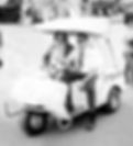 Ed and Darrell Gossett riding and ERMCO golf cart around the Indiana State Fair in the 1960s