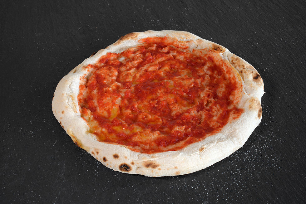 Unbaked pizza tonda with tomato sauce spread evenly to the edge