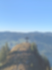Berggipfel mit Stuckli Kreuz in den Schweizer Alpen bei klarem Wetter
