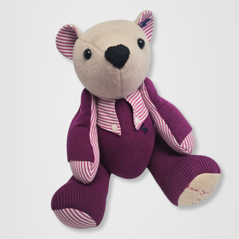Traditional jointed shirt memory bear handcrafted from a purple knitted jumper and a pink and white striped collared shirt. Custom memorial keepsake by Deborah Jameson Creations featuring an original chest logo emblem and replicated handwriting embroidery on the paw
