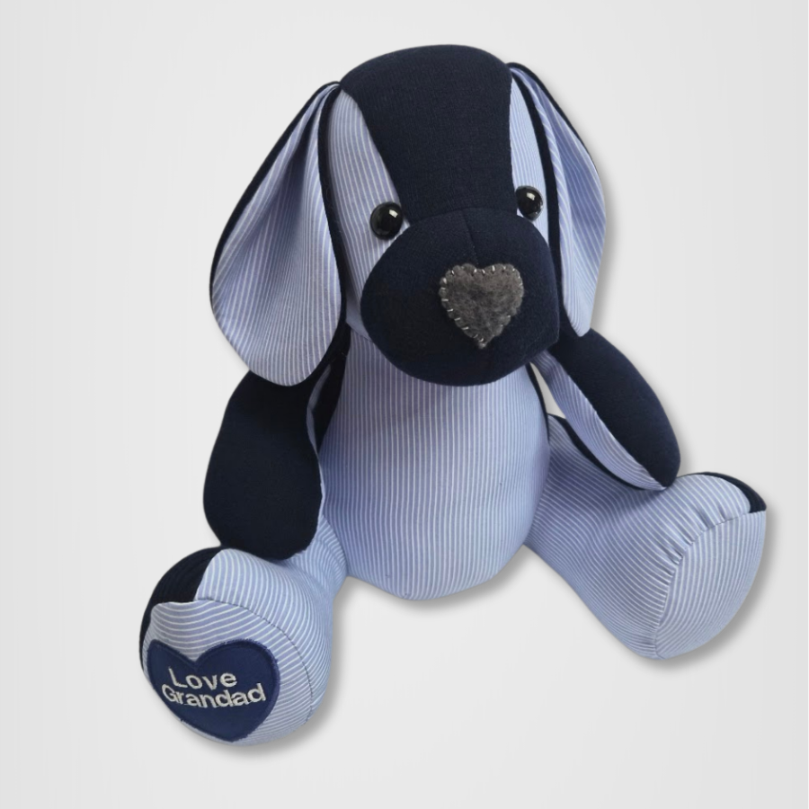 Handmade keepsake dog made from a loved one's clothing in pale blue pinstripe fabric with navy contrast panels,