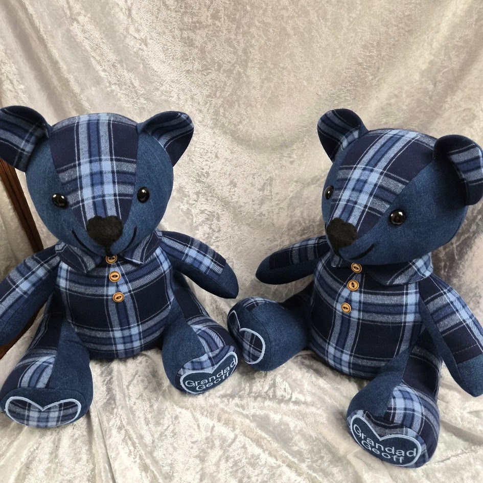 Handmade memory bear made from a loved one's shirts in navy blue plaid fabric with original buttons