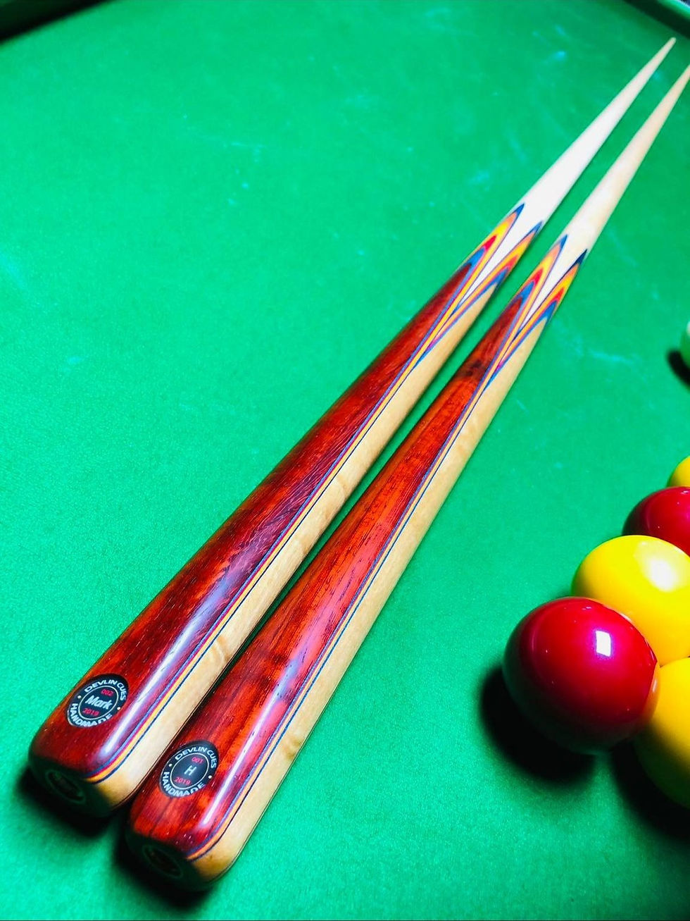 Matching cues with multi coloured veneers, Satinwood sides and Bloodwood top and bottom splices