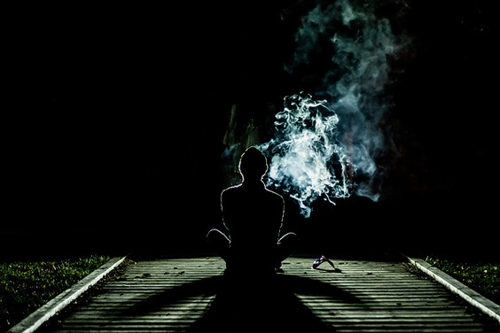 Person at Night with Smoke