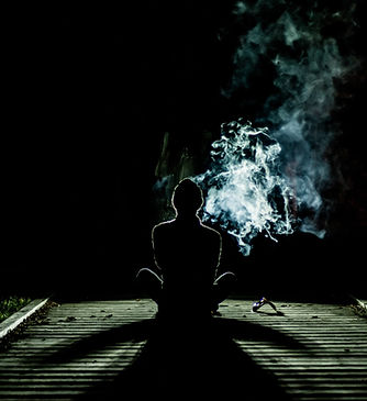 Person at Night with Smoke