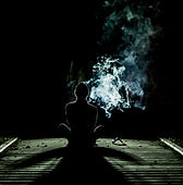 Person at Night with Smoke