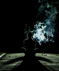 Person at Night with Smoke