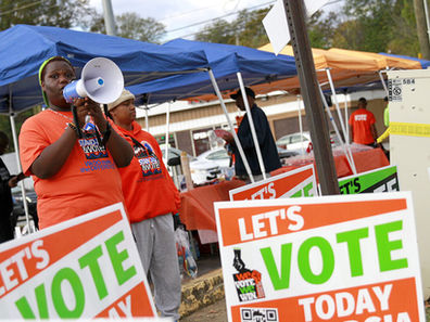Groups find ways to hand out free food and water near Georgia polls despite voting law prohibitions