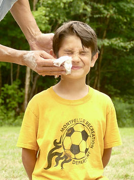A camper preparing for a game