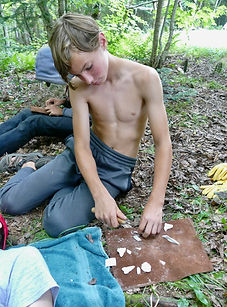 Primitive Skills boy knapping arrow heads