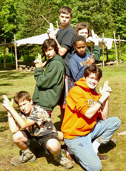 A tipi group of campers and their counselor