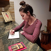 AllieDrawingHeadshot (1).jpg