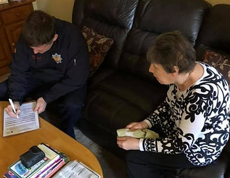 Member of Northumberland Fire and Rescue completing a home fire safety check