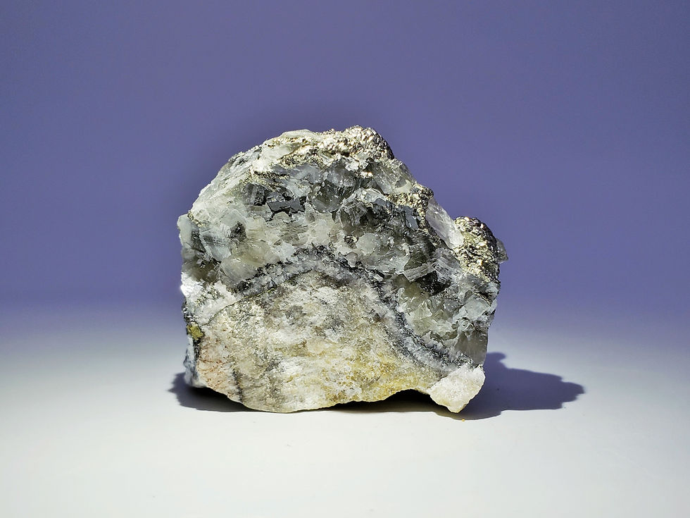 Thumbnail: Chalcopyrite on Calcite from Daye Copper Mine