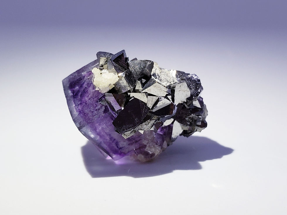 Thumbnail: Phantom Fluorite with Arsenopyrite and Mica from Yaogangxian Mine