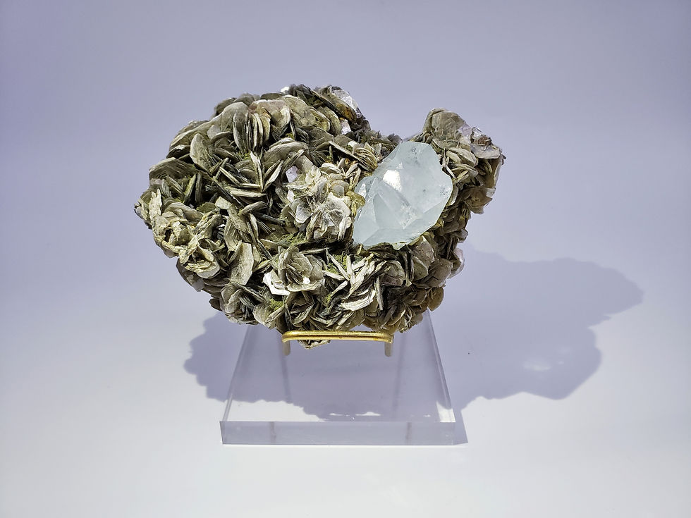 Thumbnail: Beryl var. Aquamarine on Muscovite from Hunza Valley, Pakistan