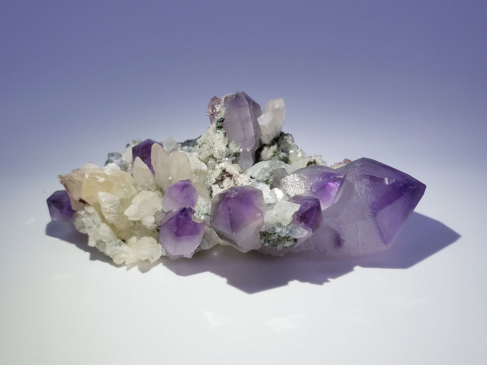 Thumbnail: Amethyst and Calcite from Fengjianshan Mine, Daye Co., China