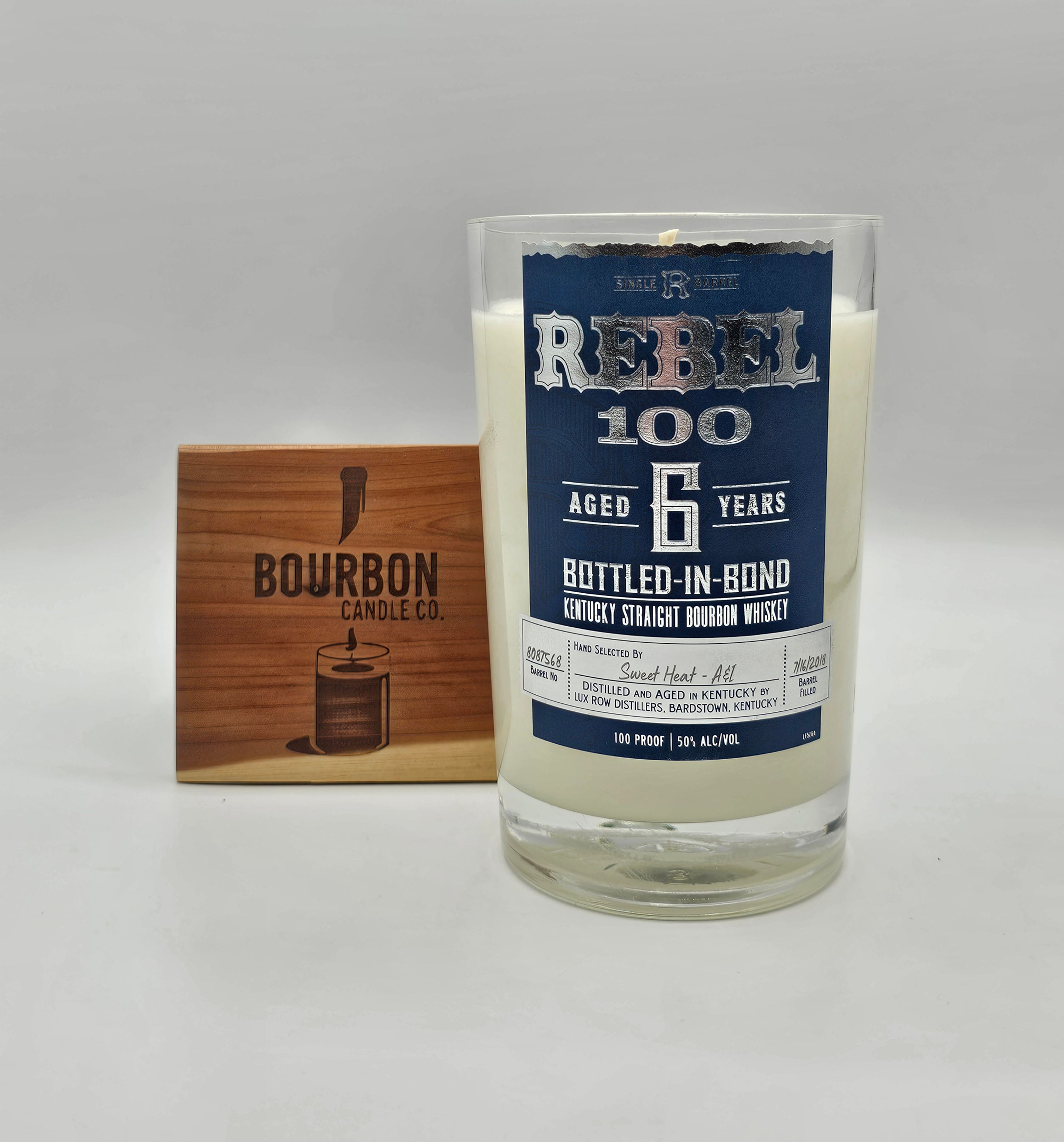 Upcycled Rebel 6-year Bottled-In-Bond Bourbon Whiskey Candle made from a recycled liquor bottle by Bourbon Candle Company
