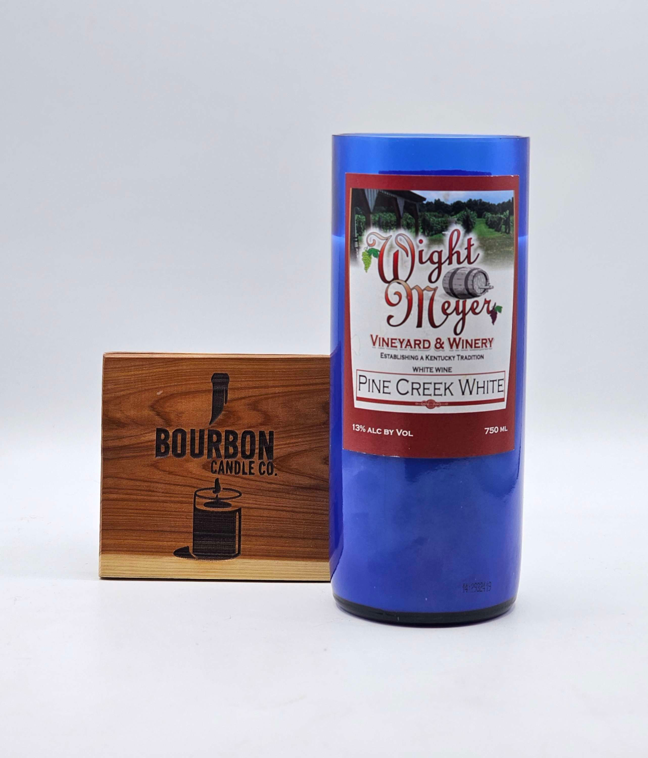 Upcycled Wine Bottle Candle made from a Wight Meyer Winery Pine Creek White wine bottle. Candle made by Bourbon Candle Co.