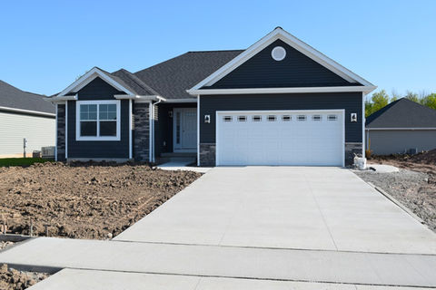 exposed aggregate driveway for a new home in Oakville Ontario
