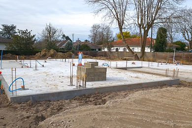 newly poured concrete foundation for a building