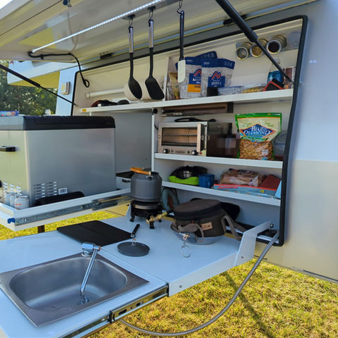 Gullwing, flatbed, pop top, Overland camper with shower, ladder, electrical system, water tank and kitchen