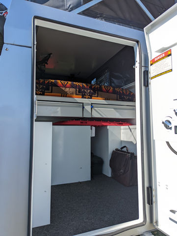 Gullwing, flatbed, pop top, Overland camper with shower, ladder, electrical system, water tank and kitchen