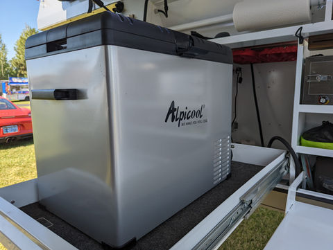 Gullwing, flatbed, pop top, Overland camper with shower, ladder, electrical system, water tank and kitchen
