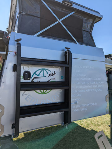 Gullwing, flatbed, pop top, Overland camper with shower, ladder, electrical system, water tank and kitchen