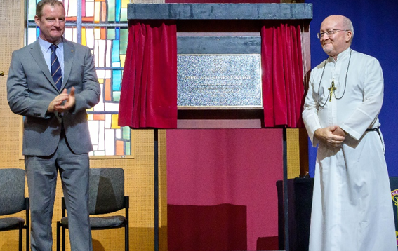 Principal Glen Seivers and Br Michael Green unveil the plaque