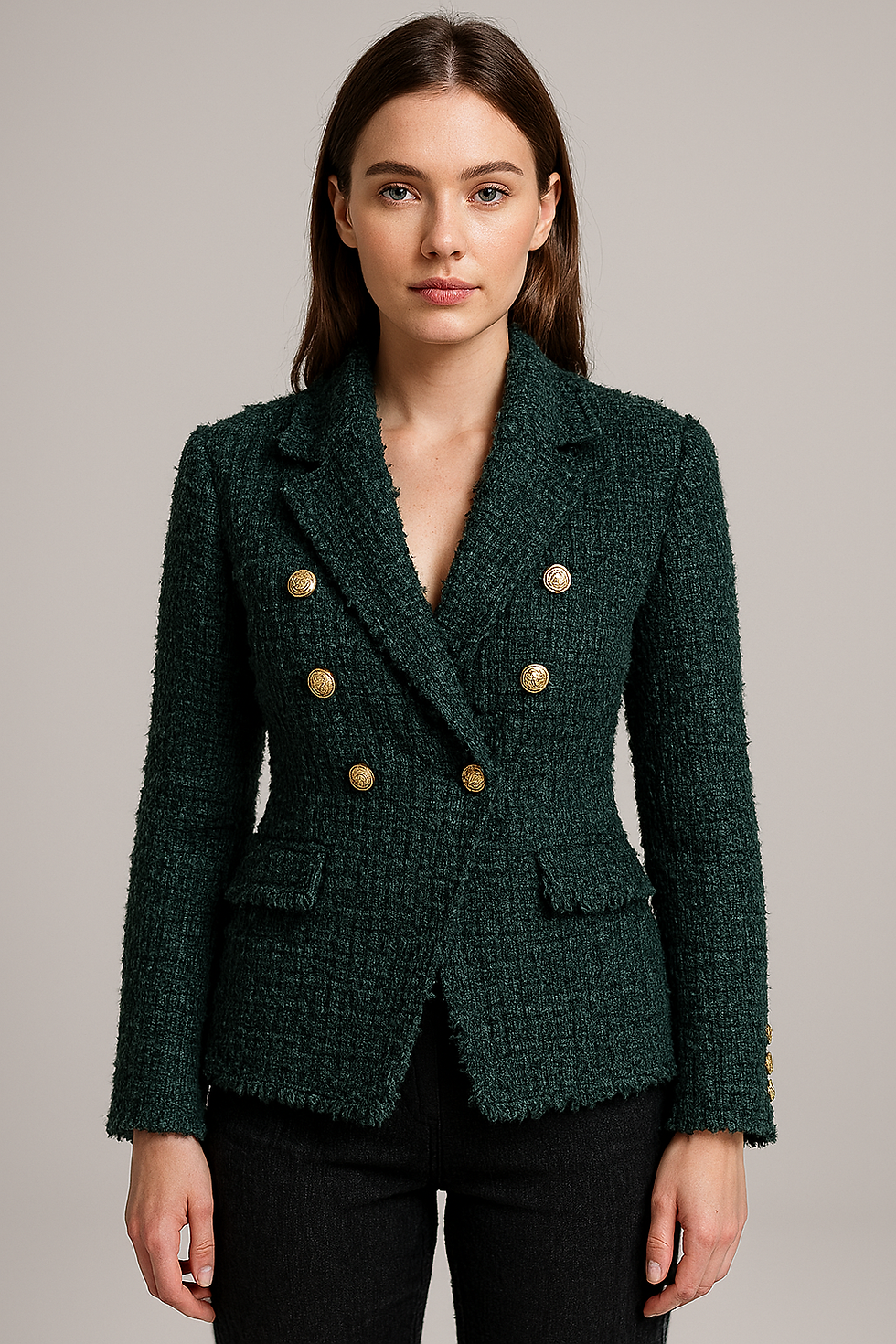 Woman in green tweed blazer with gold buttons