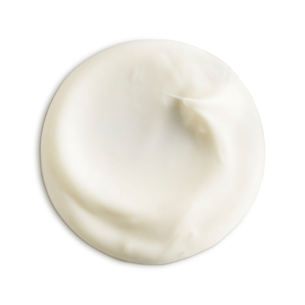 Swirl of creamy lotion, white background, moisturizing skincare product. Update - Skin by Tae.
