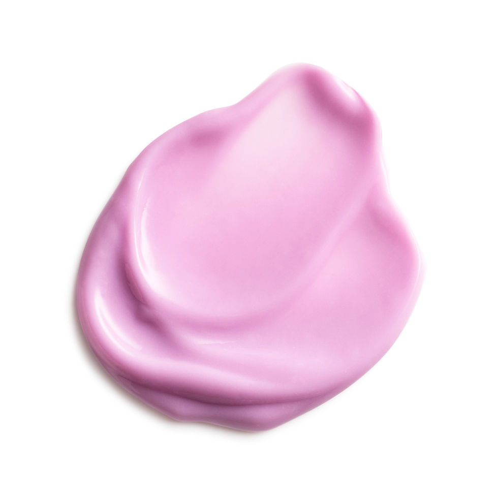 Pink cream smear on a white background, Citrus Lip Balm, smooth and glossy.
