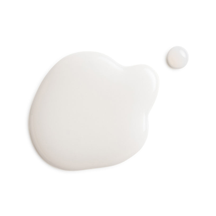 White skincare drops on a white background, Radiant Protection SPF Fluid, skincare.