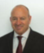 Portrait of a team member from a business incubator and financial literacy program