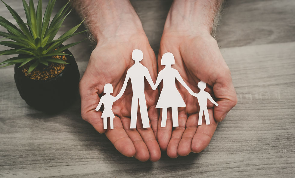 Hands protecting a family; symbol of life insurance.jpg