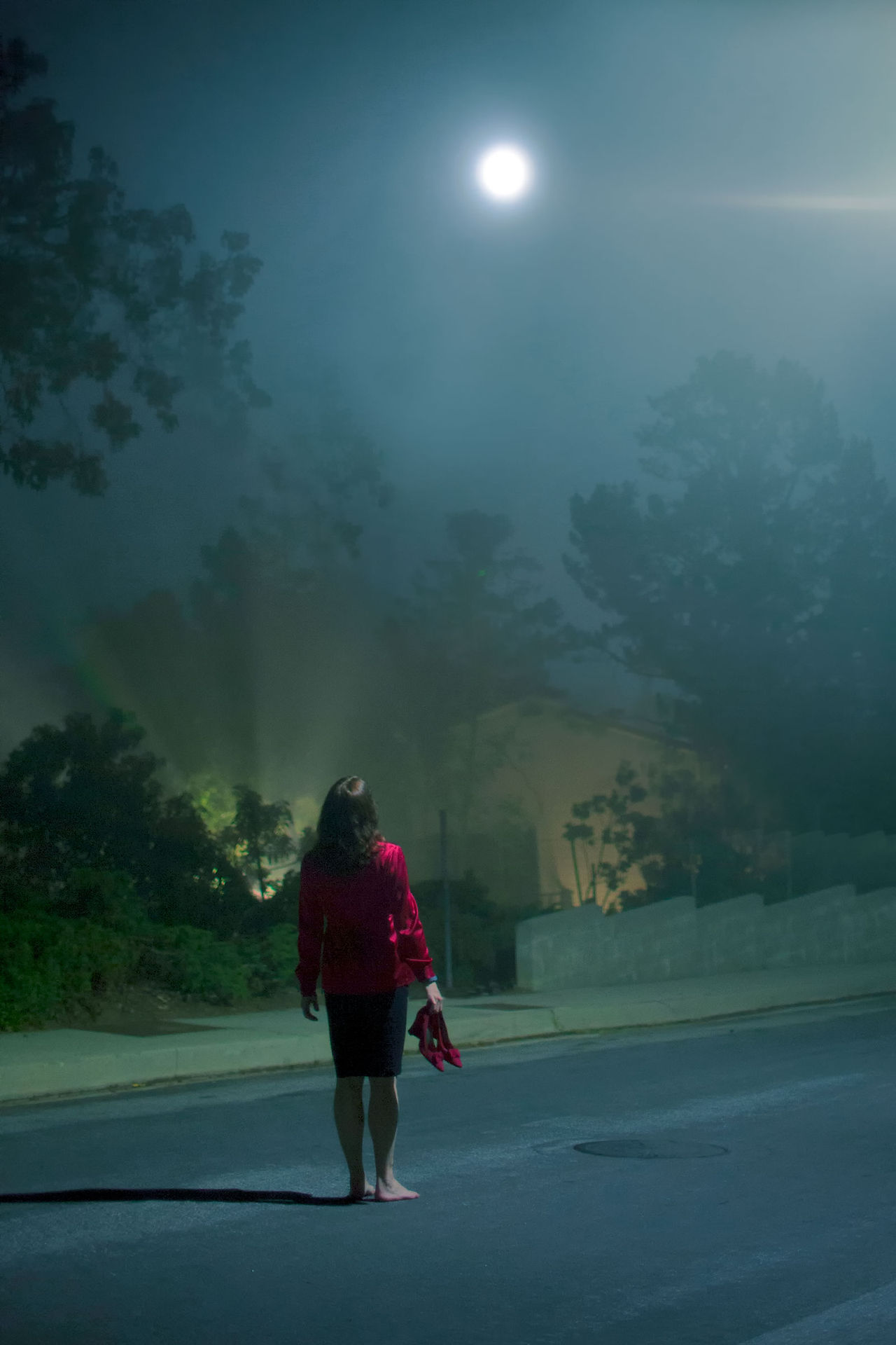 Woman with red shoes