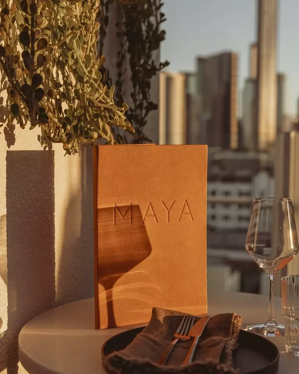 Leather bound menu at rooftop bar