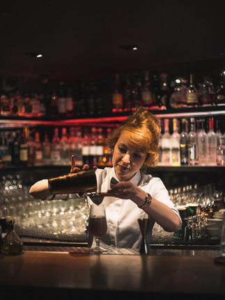 Bartender mixing a delicious cocktail