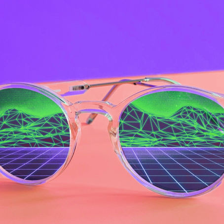 A pair of sunglasses reflect vision with mountain blueprints in the lens. Bright playful colours depict a modern and energetic feel.