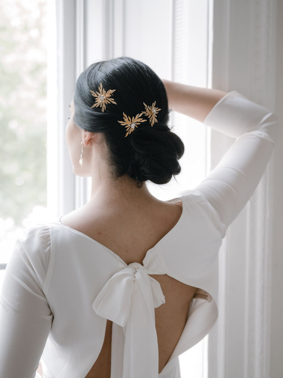 Handcrafted celestial bridal hair accessory with star and moon detailing from The Astral Collection by Garter & Veil