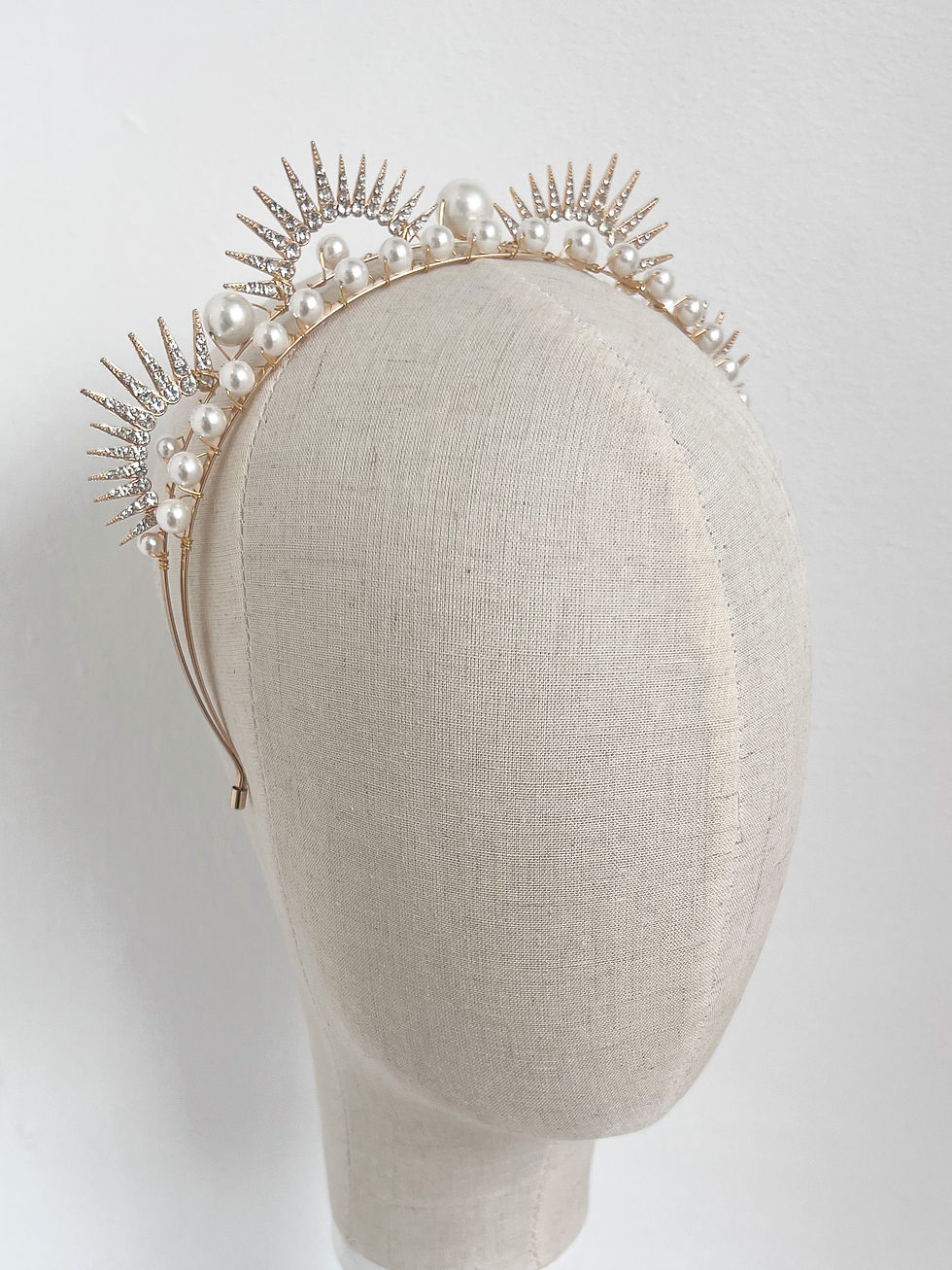Thumbnail: gold celestial bridal crown on mannequin