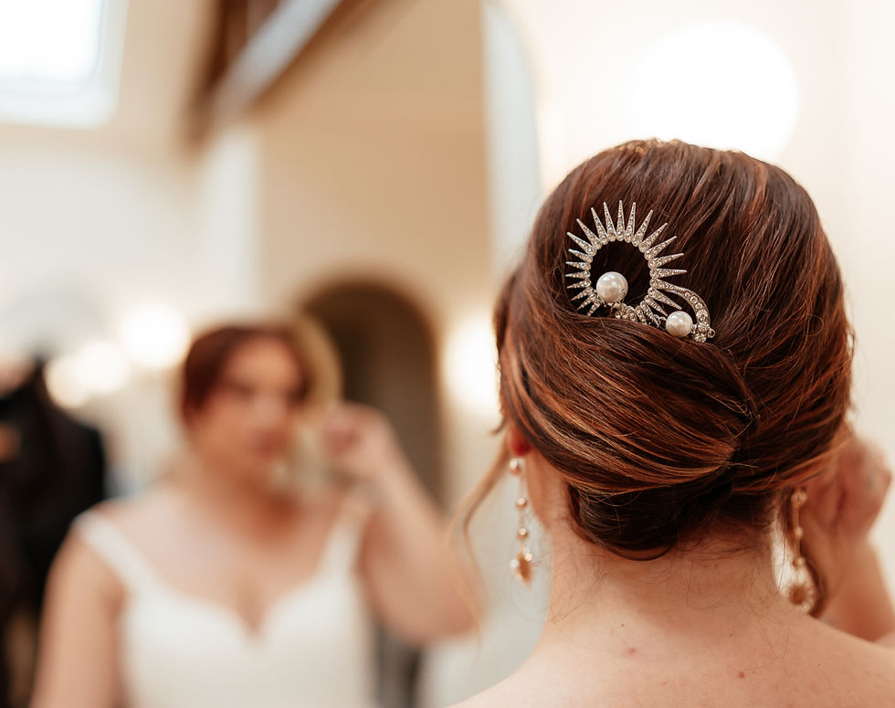 bride trying hair accessories