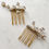 Thumbnail: Handcrafted celestial bridal hair combs with star and moon detailing from The Astral Collection by Garter & Veil
